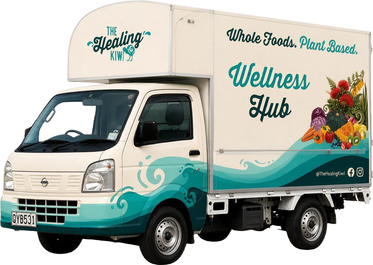 The Healing Kiwi food truck, wrapped in teal waves with 'Whole Foods. Plant Based.' and 'Wellness Hub' on the side